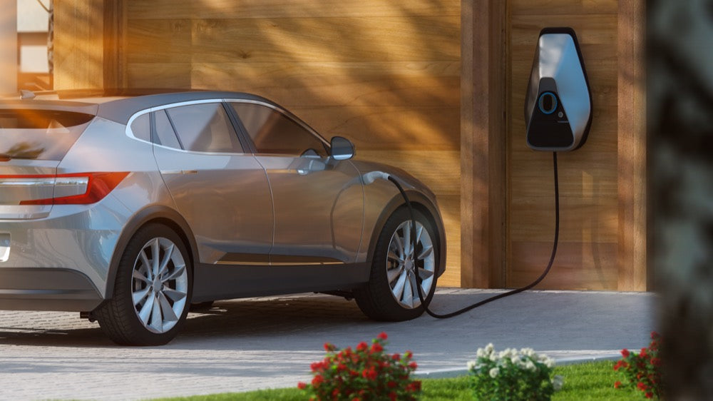 Electric vehicle charging at a home wallbox